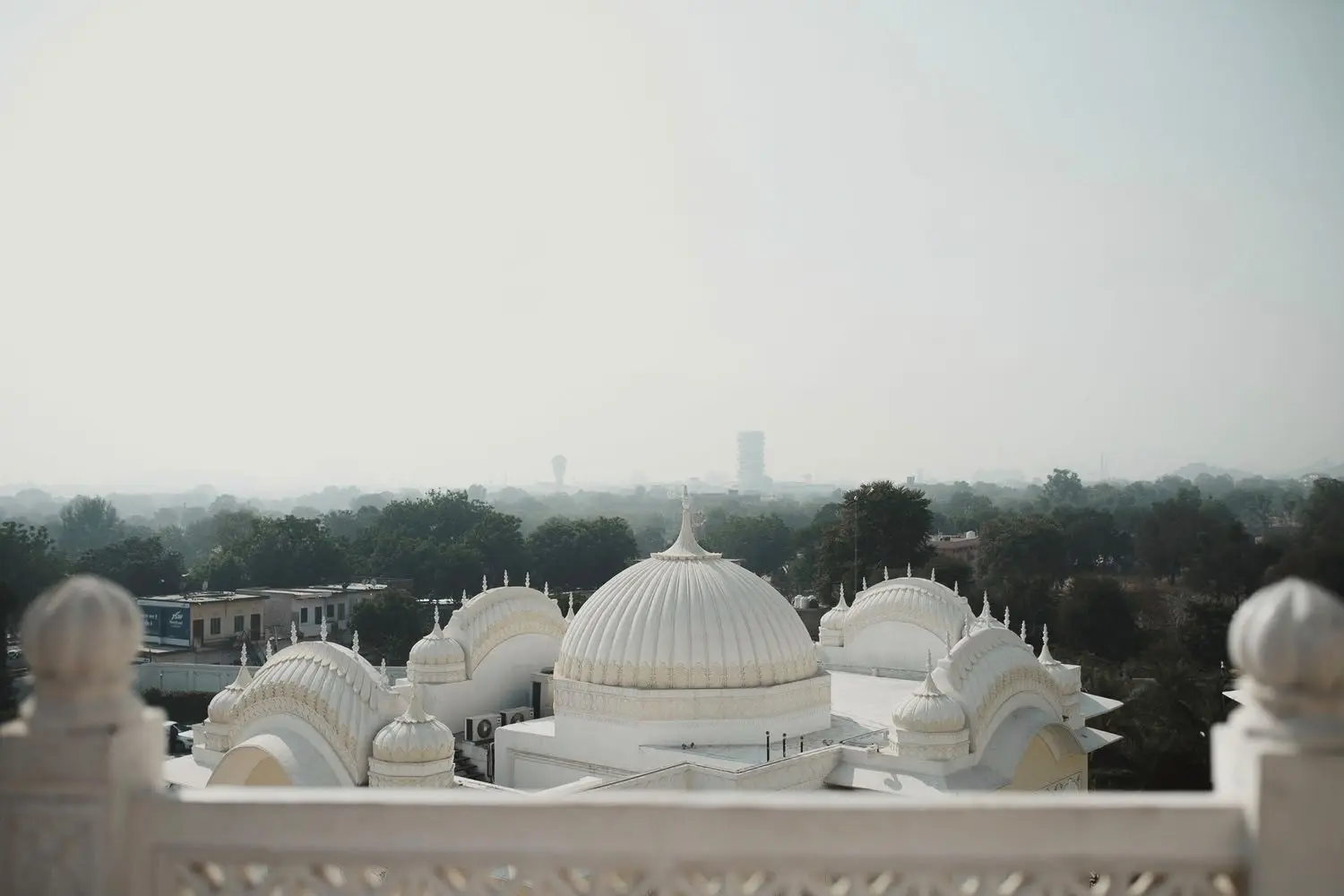 Aerial view of white palace domes at a wedding venue